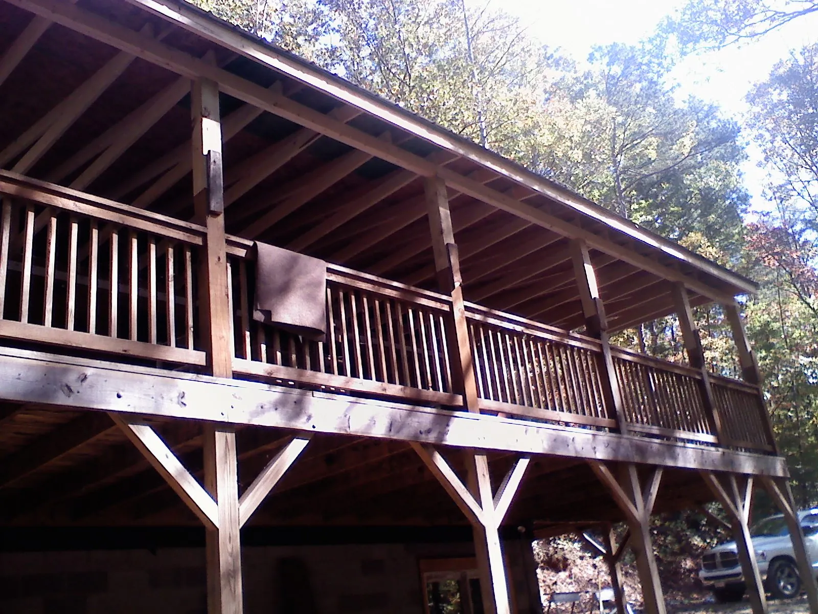 Timber framing under a new elevated porch and deck — Roof Leak Repair in Forman by Roofing Brothers